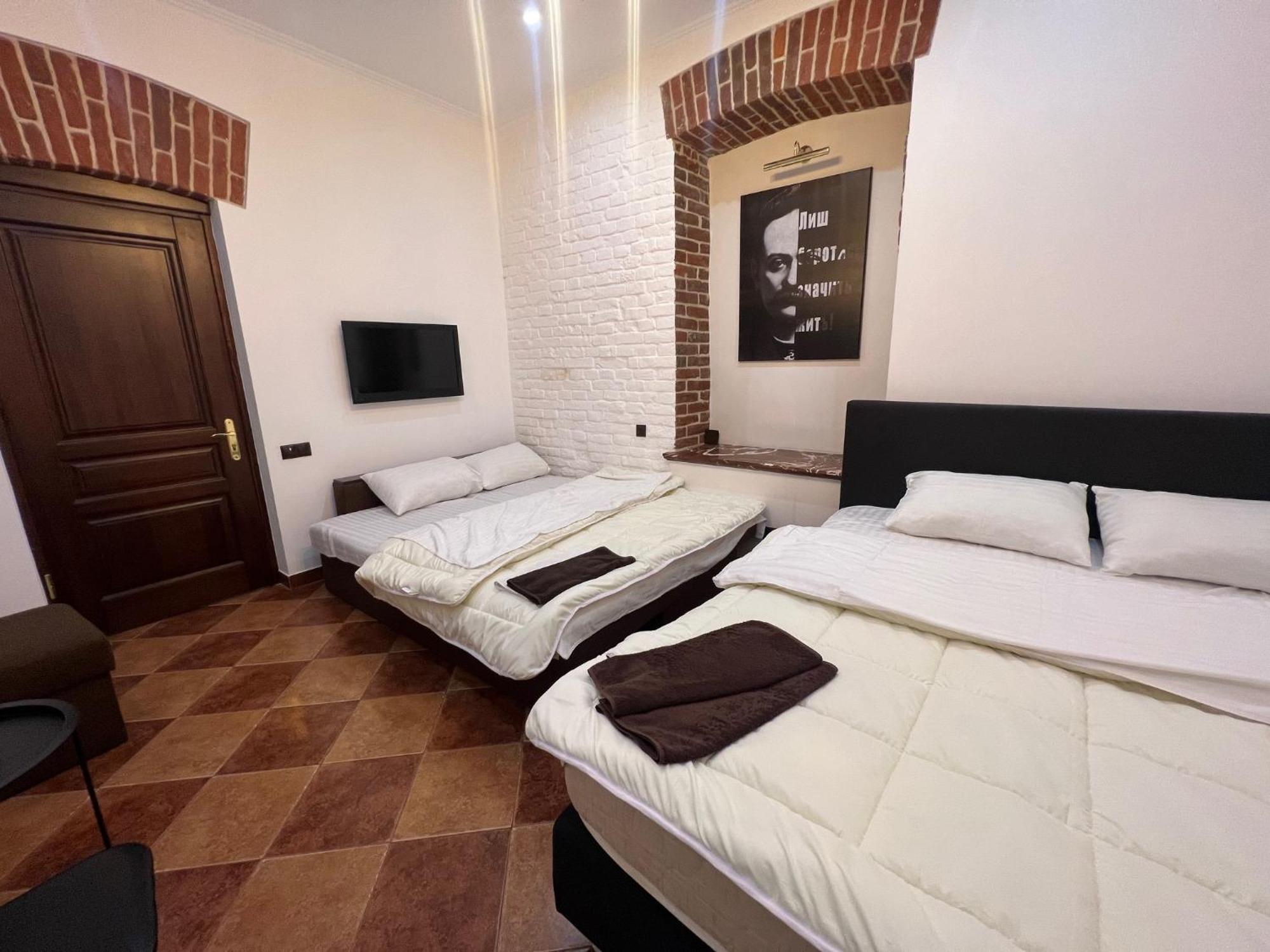 Ukrainian House Апартаменти На Площі Ринок Leopoli Esterno foto