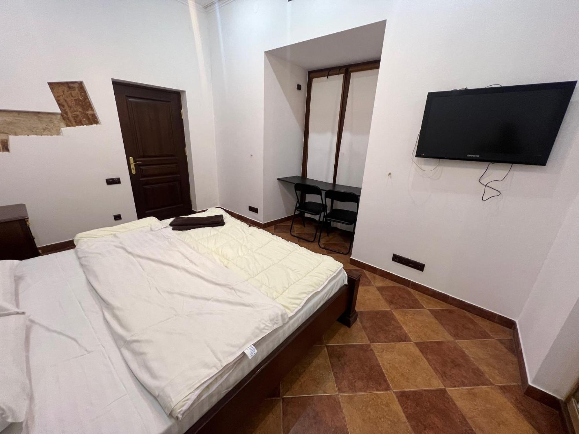 Ukrainian House Апартаменти На Площі Ринок Leopoli Esterno foto
